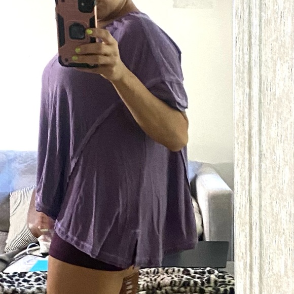 Lilac purple inside-out seam curved hem loose top. - Picture 16 of 16